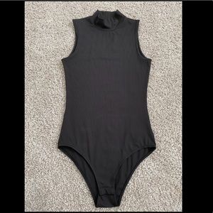 Ribbed Sleeveless Turtleneck Bodysuit